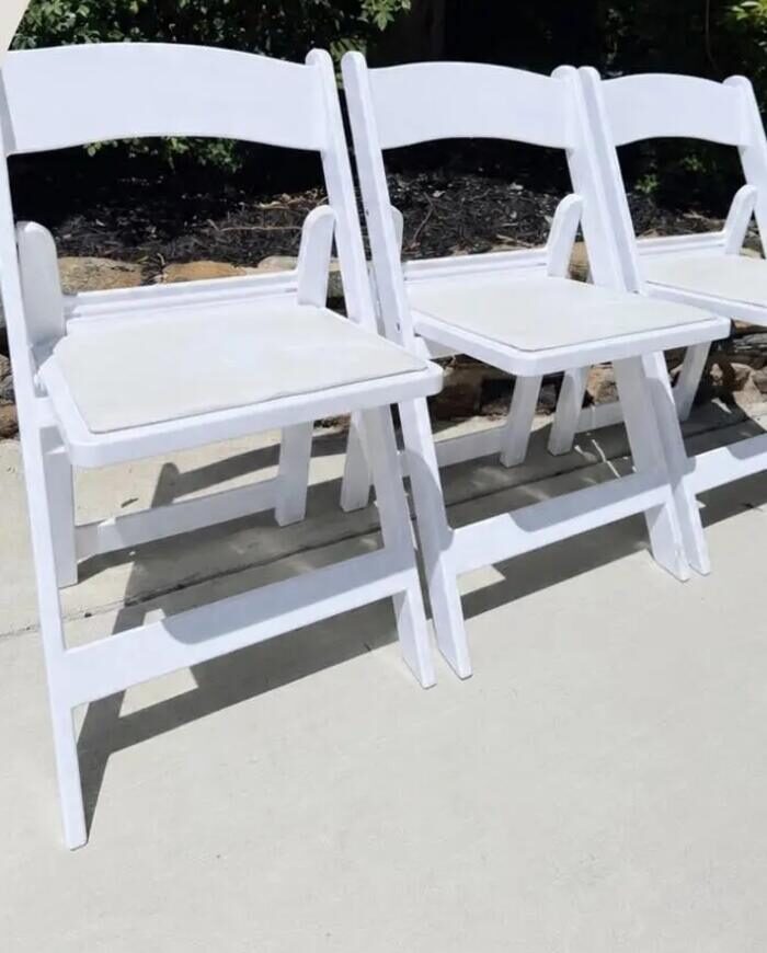 White padded folding chairs available to rent from Simply Social